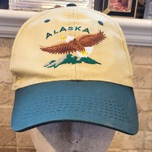 Alaska Shirt Company Tan and Green Snapback Hat. Has eagle flying